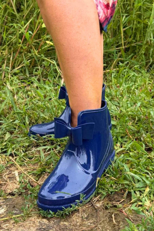 Blue rain boots with bow details