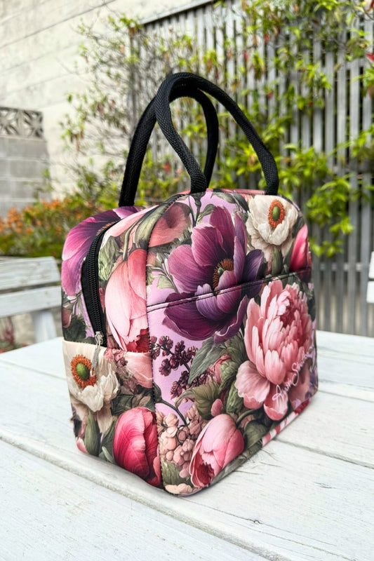 Floral lunch bag with zip closure and handles