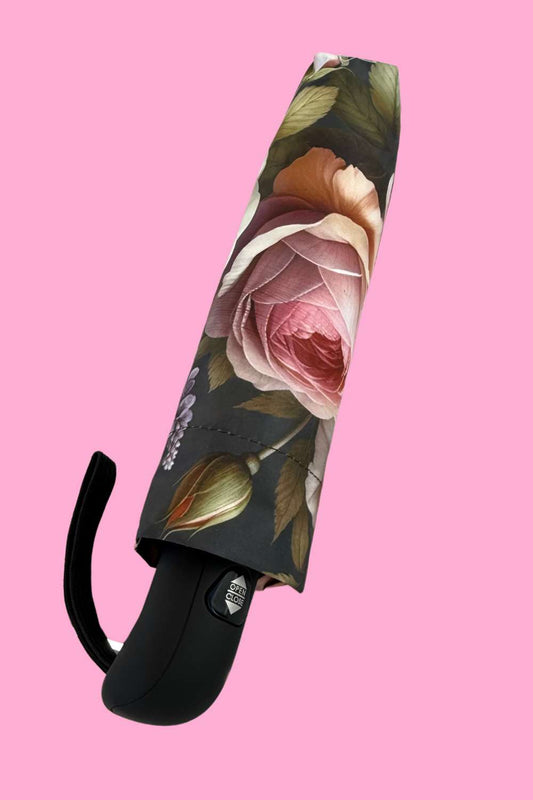 compact umbrella with matching floral cover
