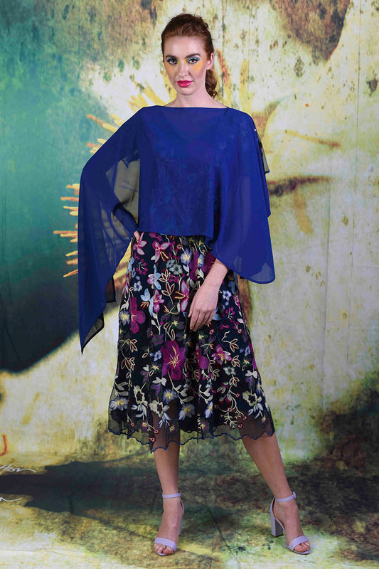 Model wearing the Annah Stretton Alison Cape in navy