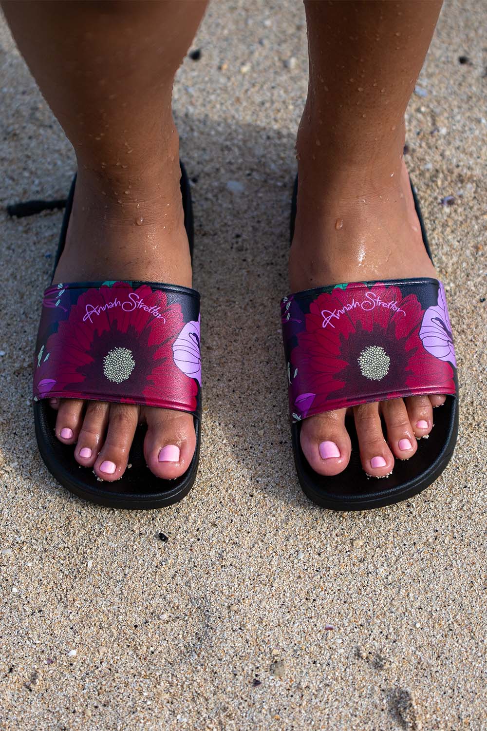 Gerbera floral slide on the beach