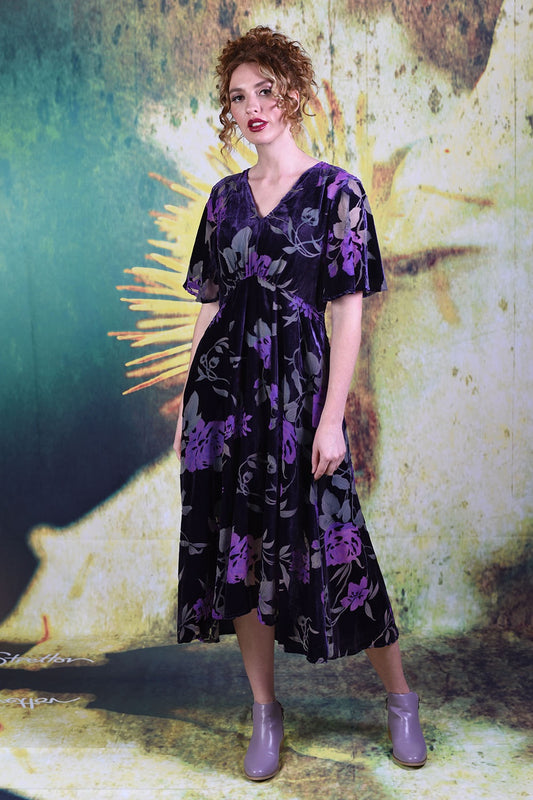 Model wearing the Annah Stretton Veronica Town Dress in Velvet Purple