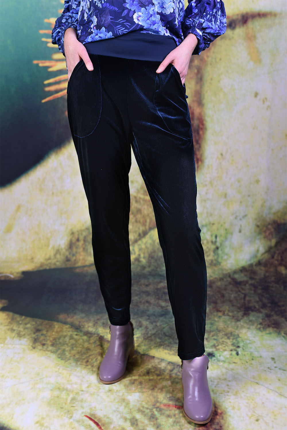 Model wearing the Annah Stretton Vesta Velvet pants in navy