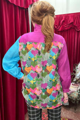 Back of the Wylie Joi Shirt showing a multi-coloured heart print pattern
