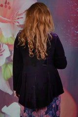 Back of model wearing the Annah Stretton Ady Grace jacket in purple
