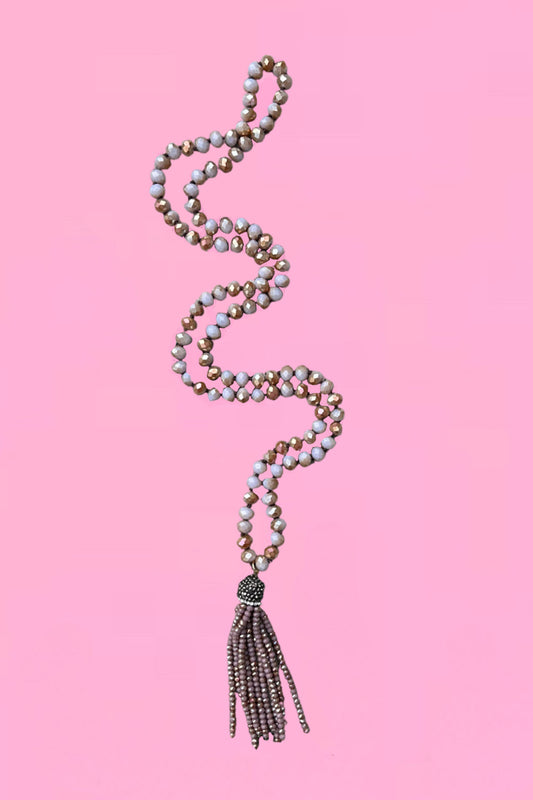 The Annah Stretton Crystal Tassel necklace in mauve