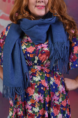 Close-up of model wearing the Annah Stretton Light Blue Dolly Scarf