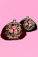 Both of the Annah Stretton Edna Coin purses in wine and navy