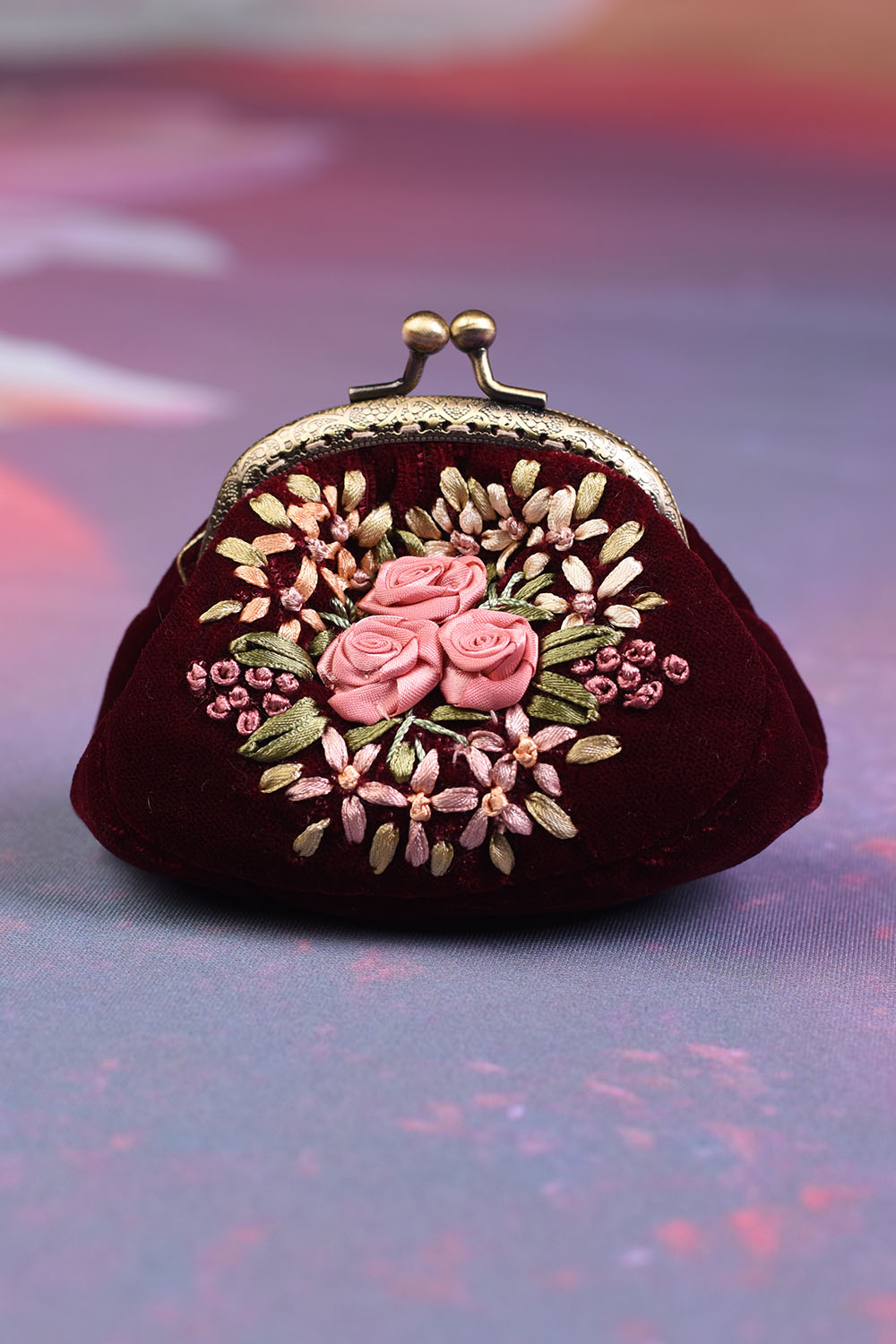 The Annah Stretton Edna purse in wine