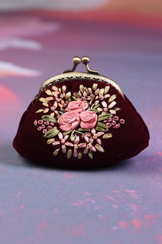The Annah Stretton Edna purse in wine