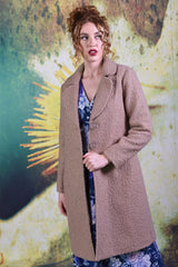 Model wearing the Heloise Coat by Annah Stretton