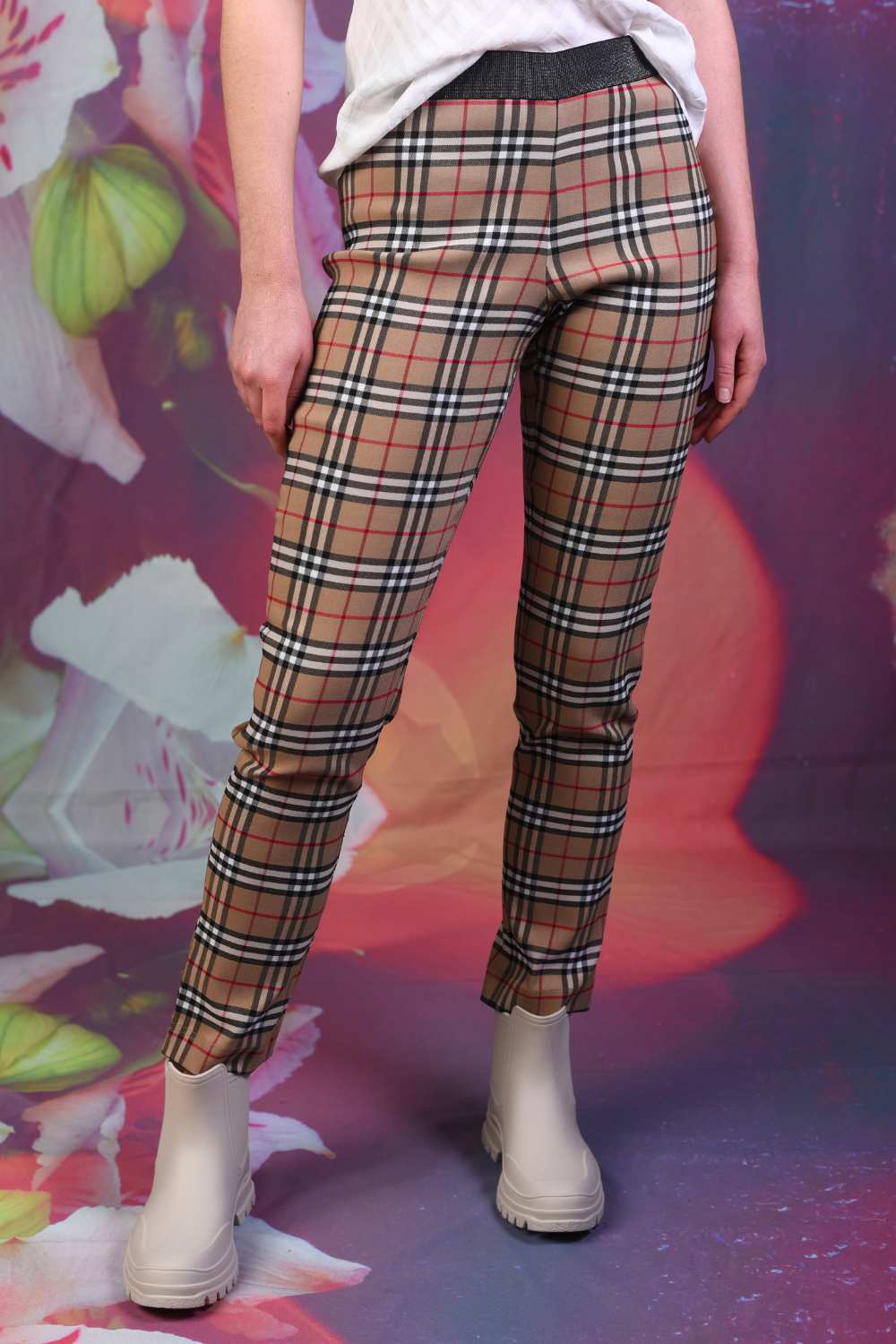 model in tartan pants and gumboot
