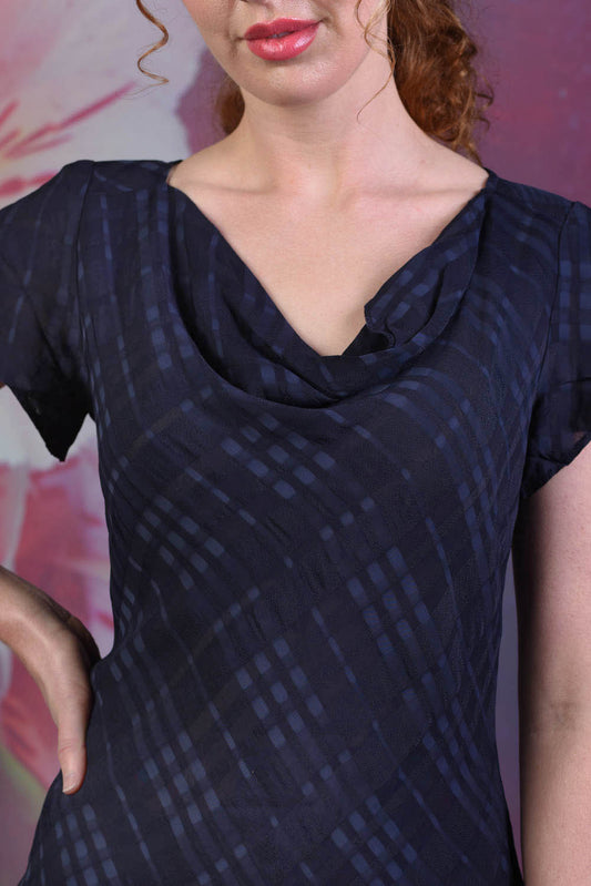 Close-up of the cowl neck of the Annah Stretton Bijou top in navy