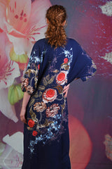 Back of model wearing the Annah Stretton Blair Emily dress in navy