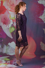 Side of model wearing the purple Annah Stretton Blair Lace dress