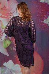 Back of model wearing the Annah Stretton Blair Lace dress in purple