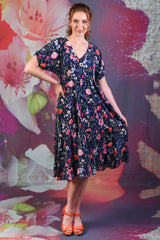 Model wearing Corsica Magic Dress - Garden Party by Annah Stretton