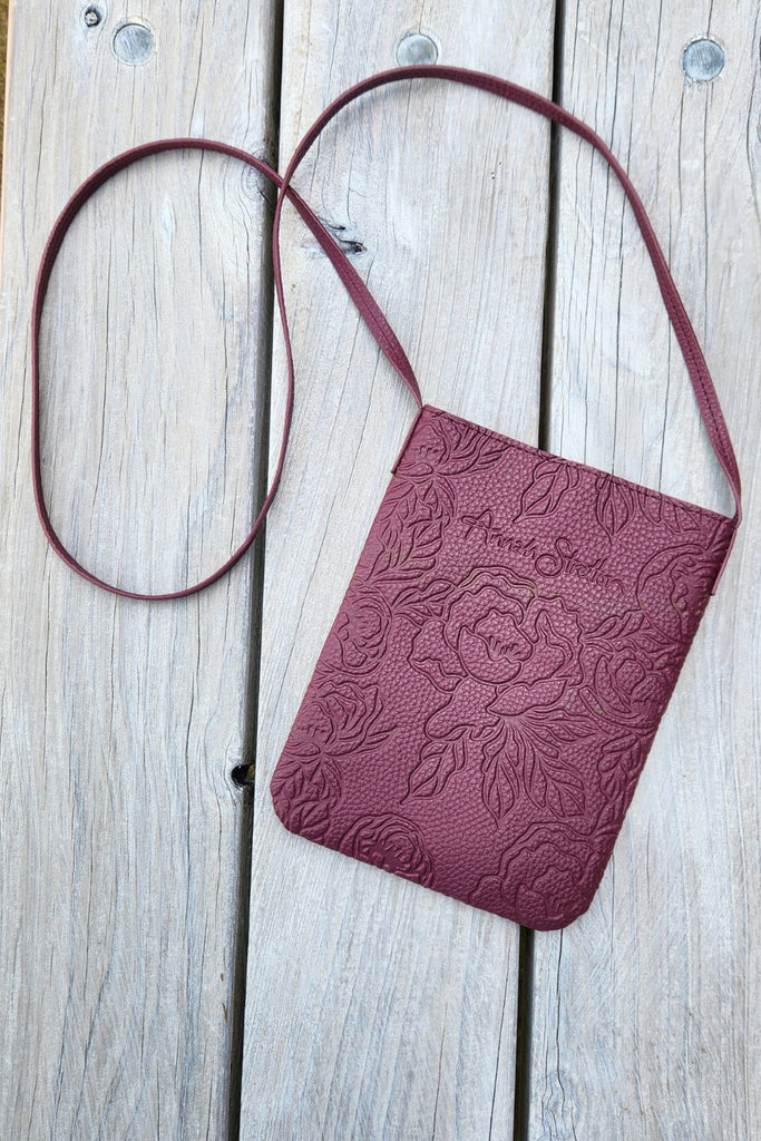 Wine cross body bag hotsell