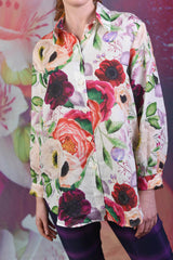 Closer shot of the multi-coloured poppy fabric of the Elsie Poppy Linen Shirt by Annah Stretton