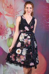 Model wearing the Annah Stretton Ink Floral Flipit Dress