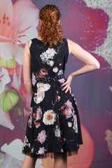 Back of model wearing the Annah Stretton Flipit dress in ink floral