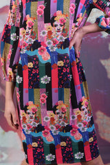 Closer shot of the Annah Stretton Gabor Blair dress, showing a geometric colourful design