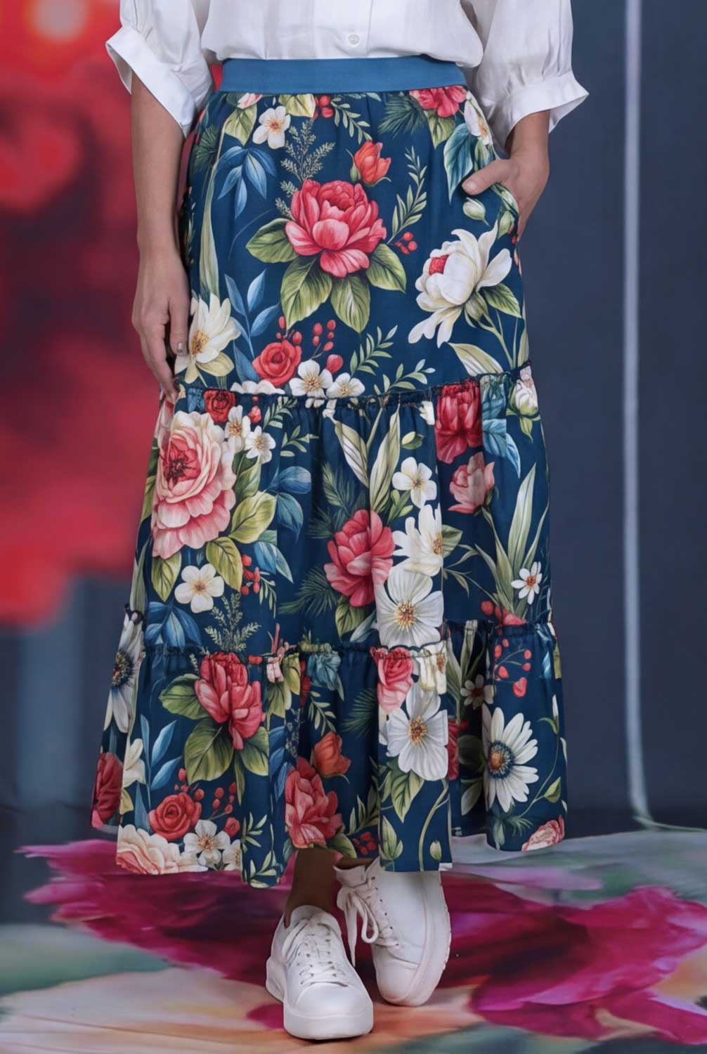 Annah Stretton Meggie Skirt in Petal Parade featuring a navy floral print, tiered maxi silhouette and glitter elastic waistband
