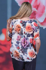 Back view of Amara Blouse Rosewater showing pleated back detail and soft floral rose print