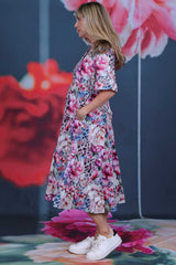Corsica Molly Dress Caged Grace by Annah Stretton – side view showing frill sleeves and tiered skirt movement in lightweight cotton