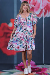 Delwyn Dress Feline Grace by Annah Stretton – front view showing tie-front neckline and vibrant floral animal print