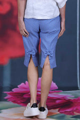 Kaye Capri Blue Check Annah Stretton – back view, showing split and bow detail at knee