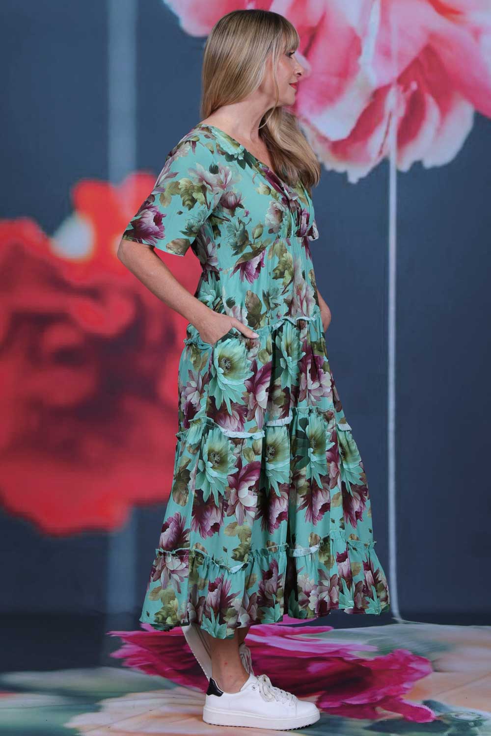 Pretty As A Picture Dress Garden Dragon by Annah Stretton – side view showing white ruffle trim between tiers and 128cm midi length in teal floral viscose