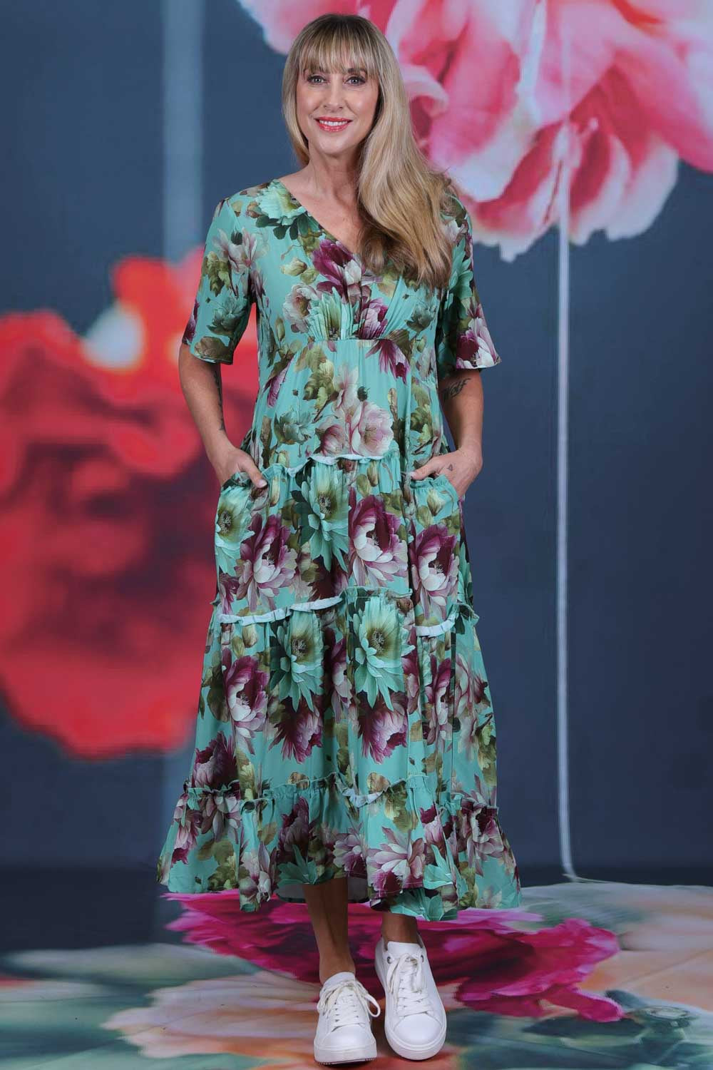 Pretty As A Picture Dress Garden Dragon by Annah Stretton – front view showing V-neckline, tiered ruffle skirt and Garden Dragon floral print in teal and burgundy