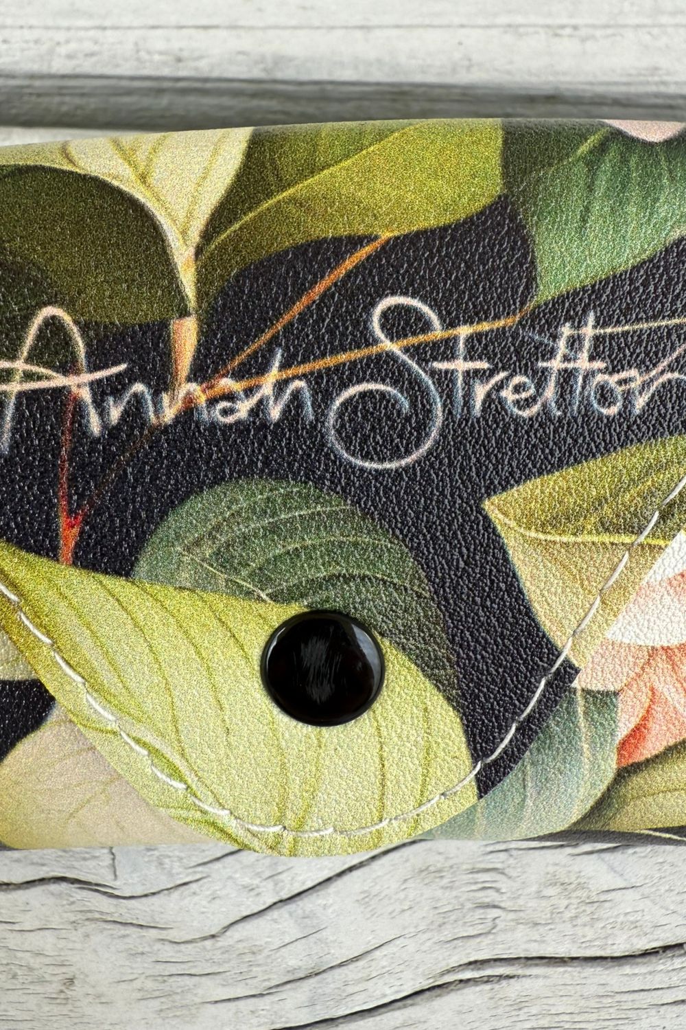 Vegan PU leather floral glasses case – imperfect finish with logo bleed
