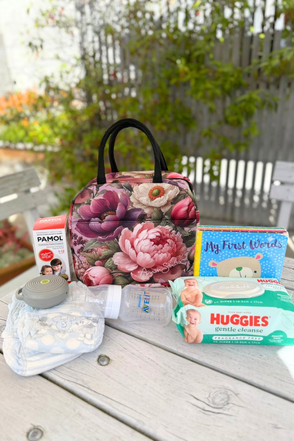 Insulated floral tote with exterior pocket