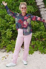 Woman wearing floral button-up shirt with collar – Annah Stretton