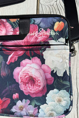 Adjustable shoulder strap and carry handles