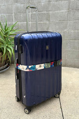Floral travel luggage band Annah Stretton