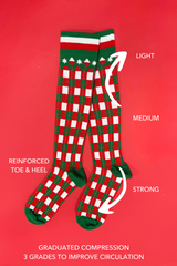 Graduated compression socks with checkered pattern on a red background