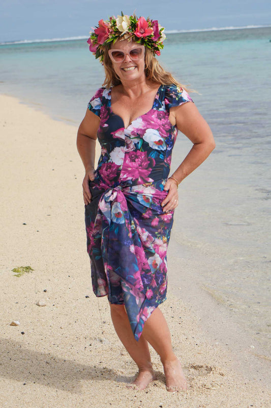 Floral one-piece swimsuit with sweetheart neckline and feminine sleeves