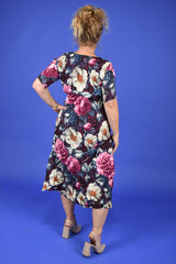 Back view Nancy Ivy Pleated Dress Jungle Mulberry – NZ women’s floral dress