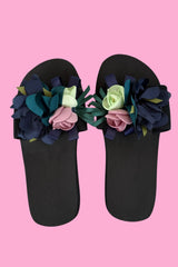 Floral statement sandals – black slides with feminine 3D roses