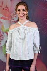 Model wearing the light blue George off the should top