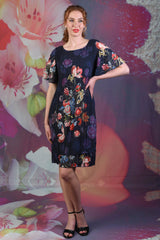 Model wearing the Annah Stretton Pleat Me Dress in Dahlia