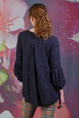 Back of the Annah Stretton Poison Irene top in navy