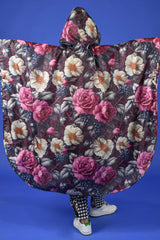 Oversized floral festival poncho – waterproof rainwear by Annah Stretton