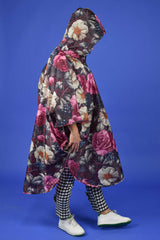 Stylish women’s rain poncho for concerts, travel, and everyday wear
