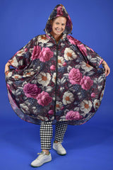 Front view of waterproof women’s rain poncho with zip pocket – Jungle Mulberry print
