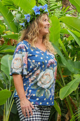 Woman wearing floral V-neck cotton top