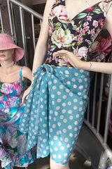 Teal Spot wrap styled as sarong